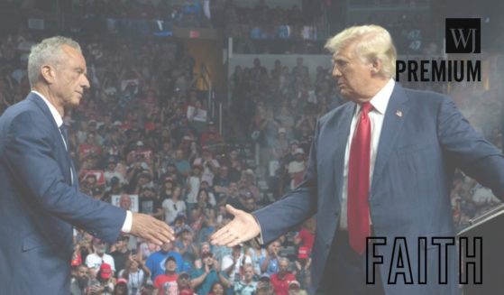 Former Democratic presidential candidate Robert F. Kennedy Jr. and the Republican presidential nominee, former President Donald Trump, shake hands during a campaign rally Aug. 23 in Glendale, Arizona. Kennedy's announcement that he was suspending his presidential campaign and supporting Trump appears to have been foretold in a 2009 prophecy.