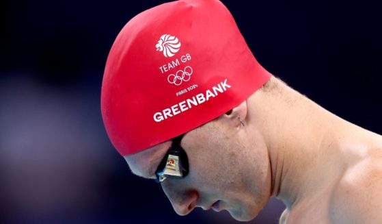 Luke Greenbank of the U.K. prepares to swim in a 200-meter backstroke heat at the Olympics in Nanterre, France, on Wednesday.