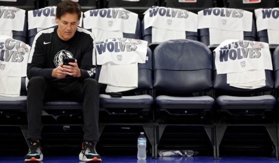 Dallas Mavericks owner Mark Cuban sits on the bench before Game Two of the Western Conference Finals between the Dallas Mavericks and Minnesota Timberwolves on May 24, 2024 in Minneapolis, Minnesota.