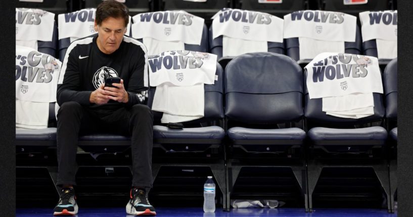 Dallas Mavericks owner Mark Cuban sits on the bench before Game Two of the Western Conference Finals between the Dallas Mavericks and Minnesota Timberwolves on May 24, 2024 in Minneapolis, Minnesota.