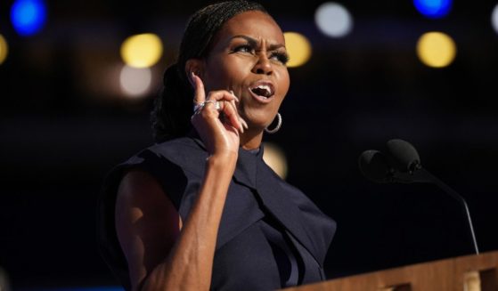 Former first lady Michelle Obama speaks on stage during the second day of the Democratic National Convention at the United Center in Chicago, Illinois, on Tuesday.