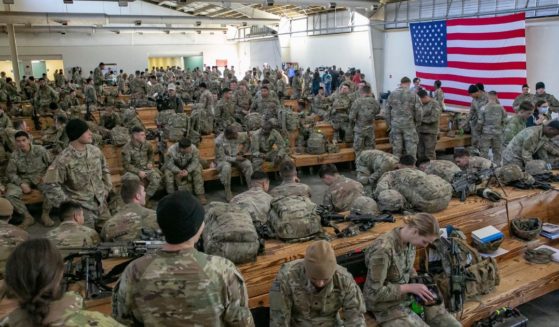 Soldiers of the 82nd Airborne Division wait to be deployed to Europe at Fort Bragg, North Carolina, on Feb. 14, 2021.