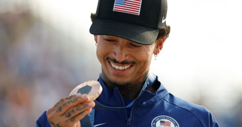 Nyjah Huston holds his bronze medal after the victory ceremony for the men's street skateboarding event during the Paris 2024 Olympic Games in Paris, France, on July 29.