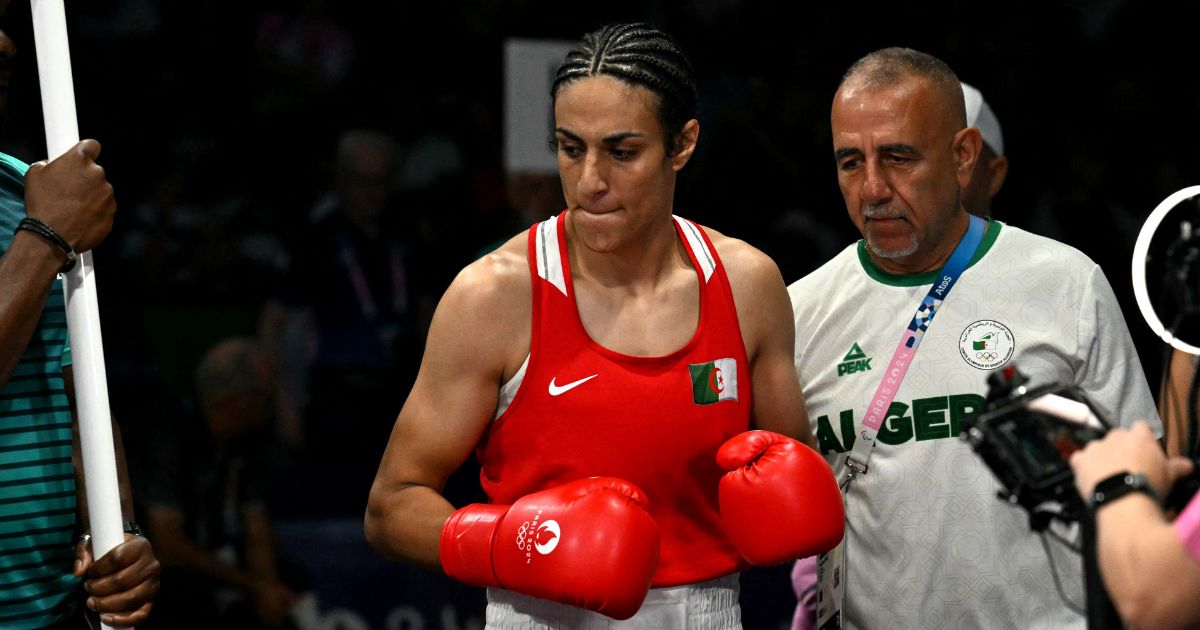 Algeria's Imane Khelif (C) arrives for her women's 66kg preliminaries round of 16 boxing match against Italy's Angela Carini during the Paris 2024 Olympic Games.