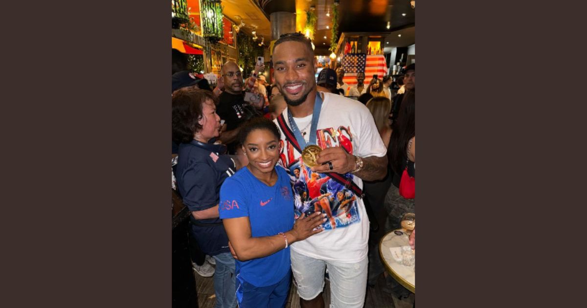 Simone Biles and husband Jonathan Owens in a photo that sparked controversy during the Olympics.