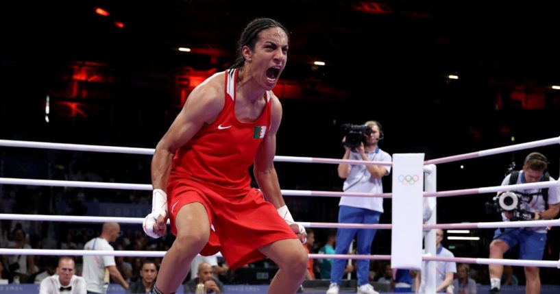 Imane Khelif of Team Algeria celebrates victory against Anna Luca Hamori of Team Hungary after the Women's 66kg Quarter-final round match on day eight of the Olympic Games Paris 2024 at North Paris Arena on August 03, 2024 in Paris, France.