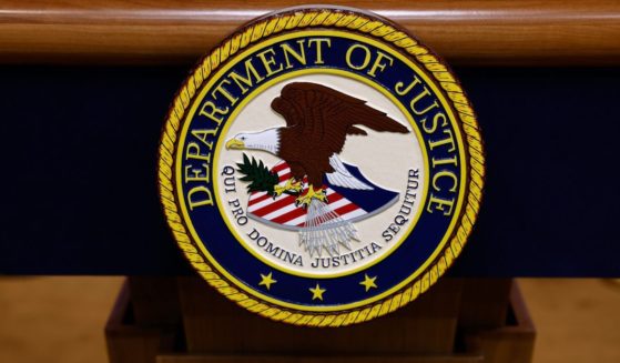 A seal for the Department of Justice is seen on a podium ahead of a news conference with U.S. Attorney General Merrick Garland at the Department of Justice Building on March 21, 2024 in Washington, DC. During the news conference, Garland and DOJ officials are expected to make an announcement about ongoing antitrust investigations.