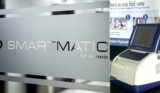 The Smartmatic logo, left, is displayed a door in Caracas, Venezuela, on Aug. 2, 2017. A model of a Smartmatic touch screen voting machine, right, sits at the entrance of the National Elections Council headquarters in Caracas, Venezuela, on June 18, 2004.