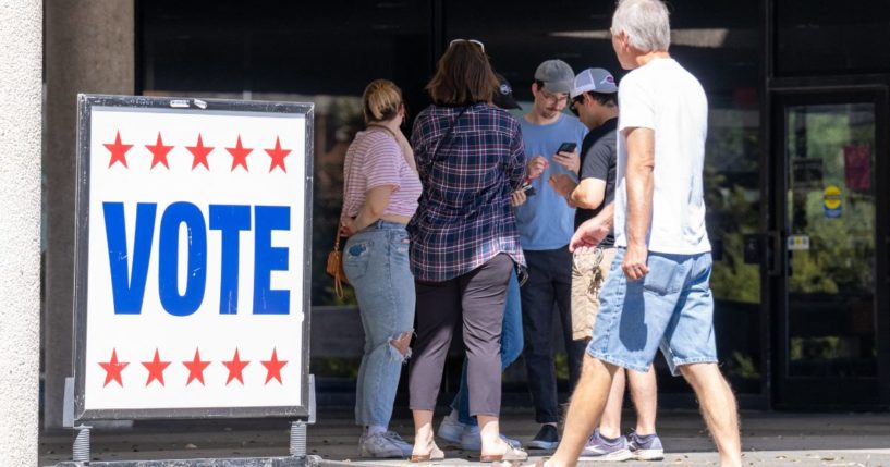 Voters enter a polling location in Austin, Texas, during the Texas primary elections on March 5.