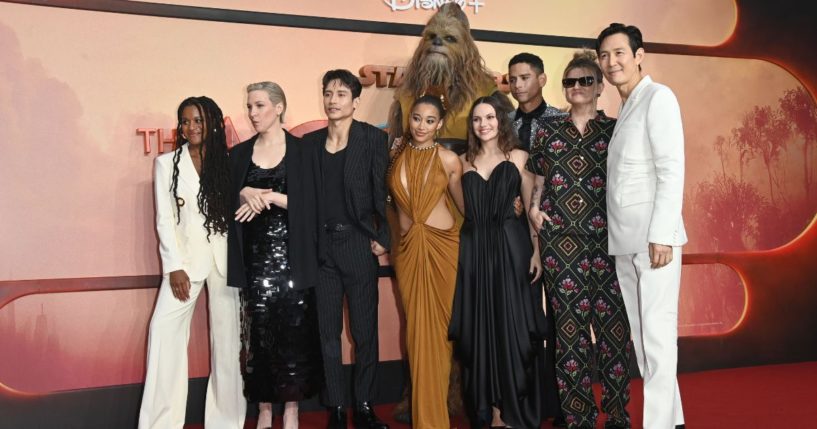 Producer Rayne Roberts, Rebecca Henderson, Manny Jacinto, Amandla Stenberg, Dafne Keen, Charlie Barnett and Lee Jung-jae attends the "Star Wars: The Acolyte" U.K. Premiere in London, England, on May 28.