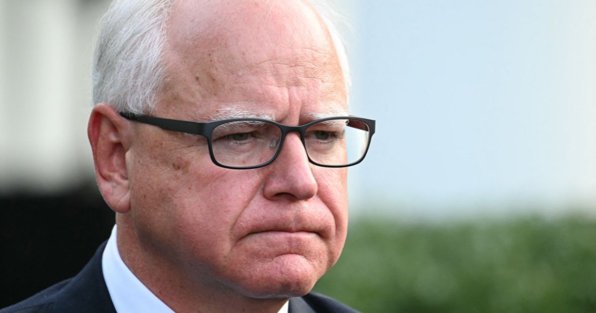 Gov. Tim Walz speaks to reporters after meeting with President Joe Biden at the White House in Washington, D.C., on July 3.