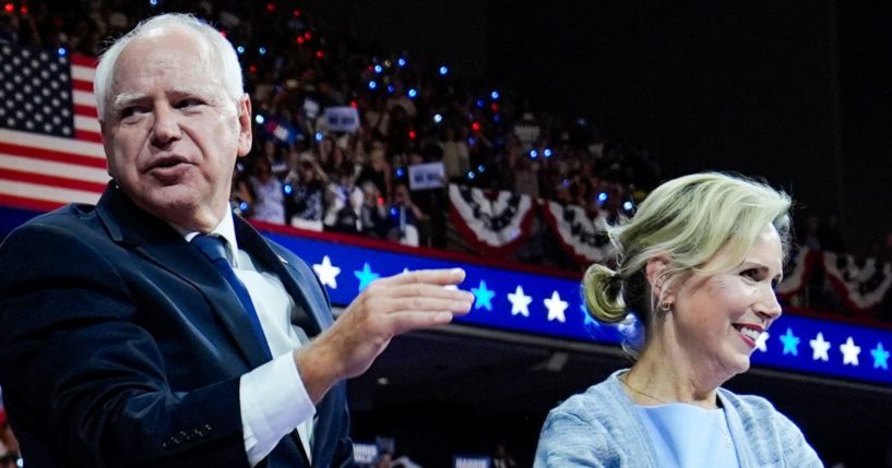 Minnesota Gov. Tim Walz and his wife Gwen Walz appear at a campaign rally in Philadelphia Tuesday after Tim Walz was announced as Kamala Harris' running mate in the 2024 presidential election.