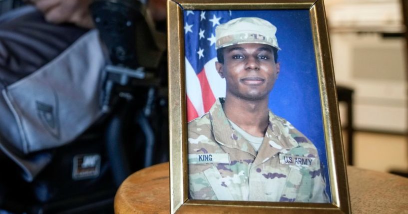 A portrait of U.S. Army Pvt. Travis King is displayed as his grandfather, Carl Gates, talks about his grandson on July 19, 2023, in Kenosha, Wisconsin.