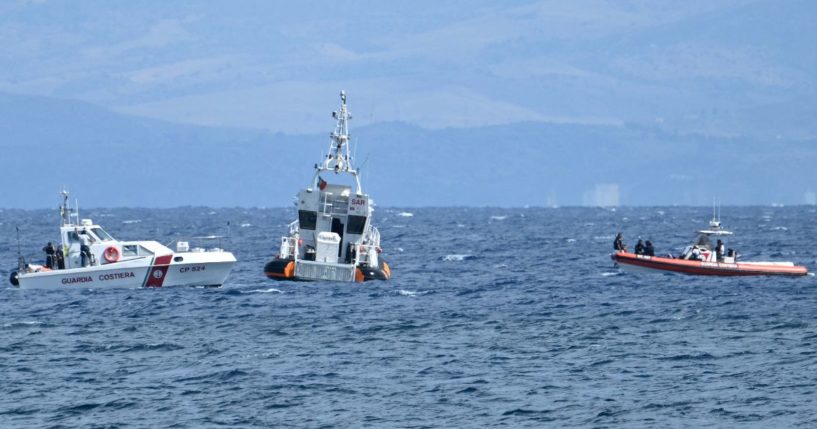 Rescue boats operate off Porticello, on August 20, 2024 near Palermo a day after the British-flagged luxury yacht Bayesian sank. Specialist divers launched a fresh search for six people, including UK tech tycoon Mike Lynch and the chairman of Morgan Stanley International, missing since their yacht capsized off the Italian island of Sicily. The Bayesian, which had 22 people aboard including 10 crew, was anchored some 700 metres from port before dawn when it was struck by a waterspout, a sort of mini tornado. Fifteen people aboard, including a mother with a one-year-old baby, were plucked to safety; one man has been found dead; and six people remain missing.