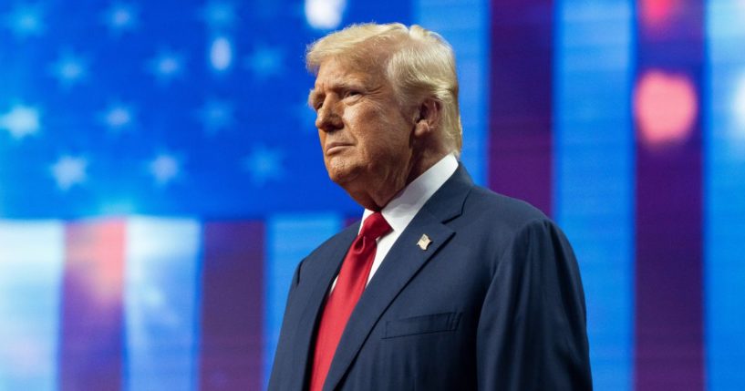 Republican presidential nominee, former U.S. President Donald Trump takes the stage during a campaign rally at Desert Diamond Arena on August 23, 2024 in Glendale, Arizona. The rally, held in partnership with Turning Point PAC and Turning Point Action, comes come two weeks after Democratic presidential nominee U.S. Vice President Harris held a rally at the same location.