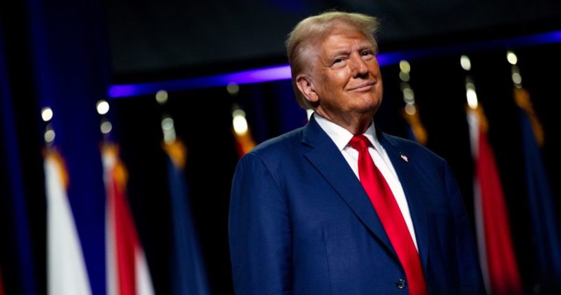 Republican presidential nominee, former U.S. President Donald Trump smiles at the crowd during the National Guard Association of the United States' 146th General Conference & Exhibition at Huntington Place Convention Center on August 26, 2024 in Detroit, Michigan. Michigan's importance to the Trump re-election campaign has become front and center as he marks his eighth visit to the state this year, including an additional event in Eaton County on August 29th.