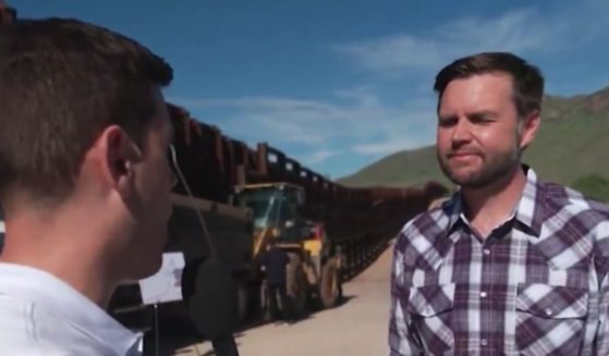 On Thursday, Republican vice presidential candidate Sen. J.D. Vance, right, took on a CNN reporter Steve Contorno, left, that attempted to race-bait him with a question about Vance's own children.