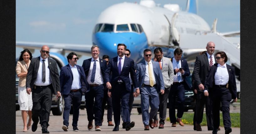 Republican vice presidential nominee Sen. J.D. Vance of Ohio walks back from looking at Air Force Two at Chippewa Valley Regional Airport, Wednesday in Eau Claire, Wisconsin.