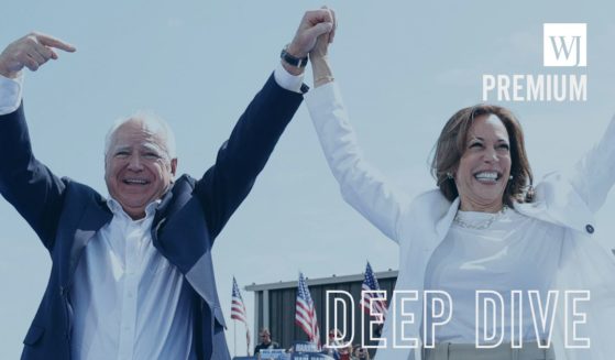 Minnesota Gov. Tim Walz, left, is seen at a campaign appearance Wednesday with Vice President and presumptive 2024 Democratic presidential candidate Kamala Harris in Eau Claire, Wisconsin.