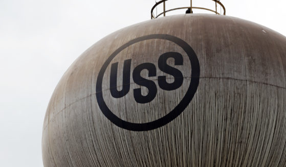 A U.S. Steel logo is seen on a water tower, May 2, 2019, at U.S. Steel's Edgar Thomson Works in Braddock, Pennsylvania.