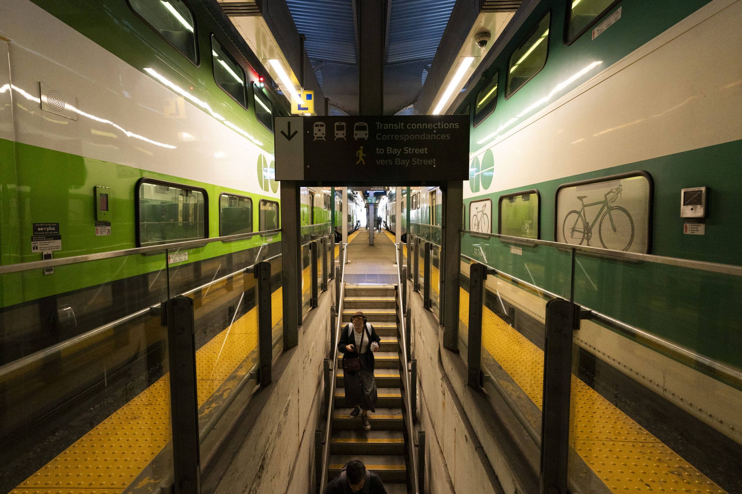 Commuters arrive at Union Station on a GO Train as a national rail shutdown causes delays in Toronto on Thursday.