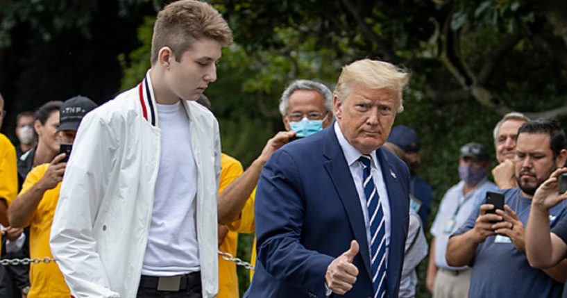 Then-President Donald Trump and son Barron are pictured in a file photo from August 2020 arriving at the White House.