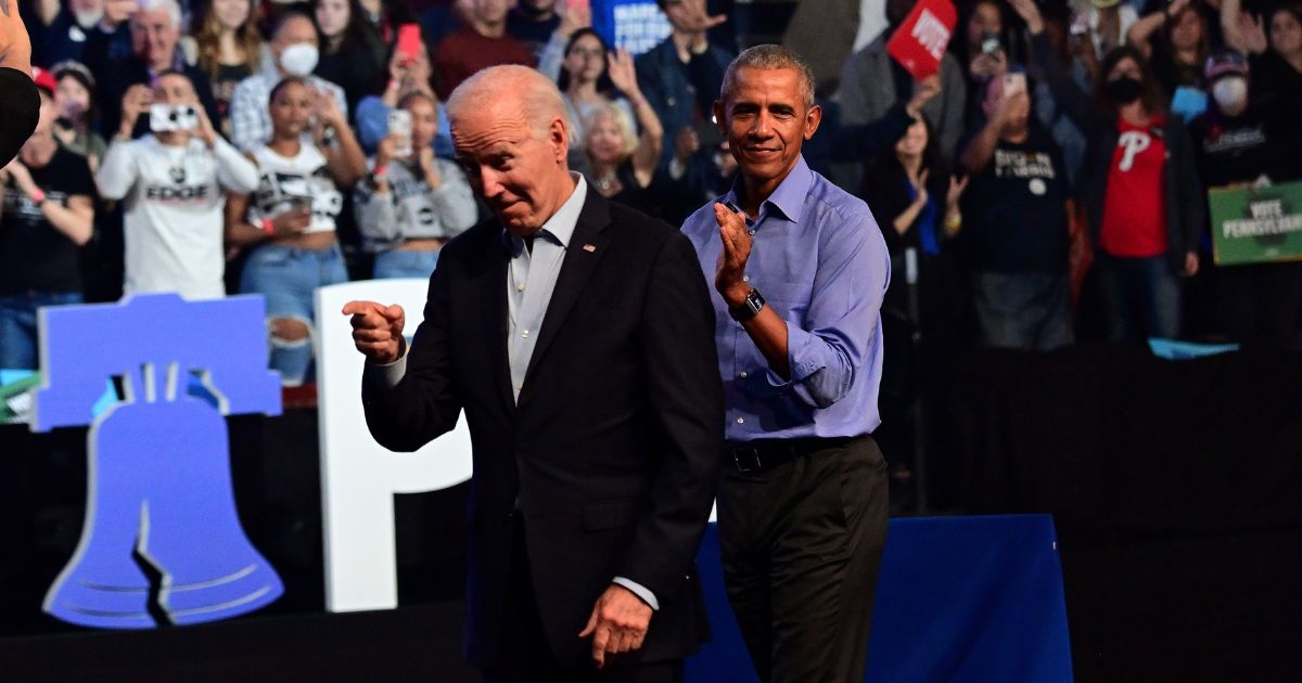 President Joe Biden, and former U.S. President Barack Obama depart a rally at the Liacouras Center on November 5, 2022 in Philadelphia, Pennsylvania.