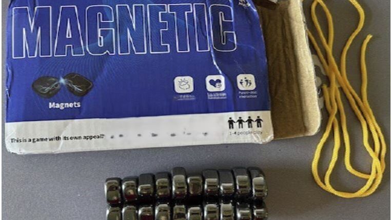 This photo provided by The U.S. Consumer Product and Safety Commission shows the front box of Magnetic Chess Game Sold by JOMO, that the U.S. Consumer Product and Safety Commission is warning consumers to immediately dispose of the magnetic game due to serious ingestion risks for children.