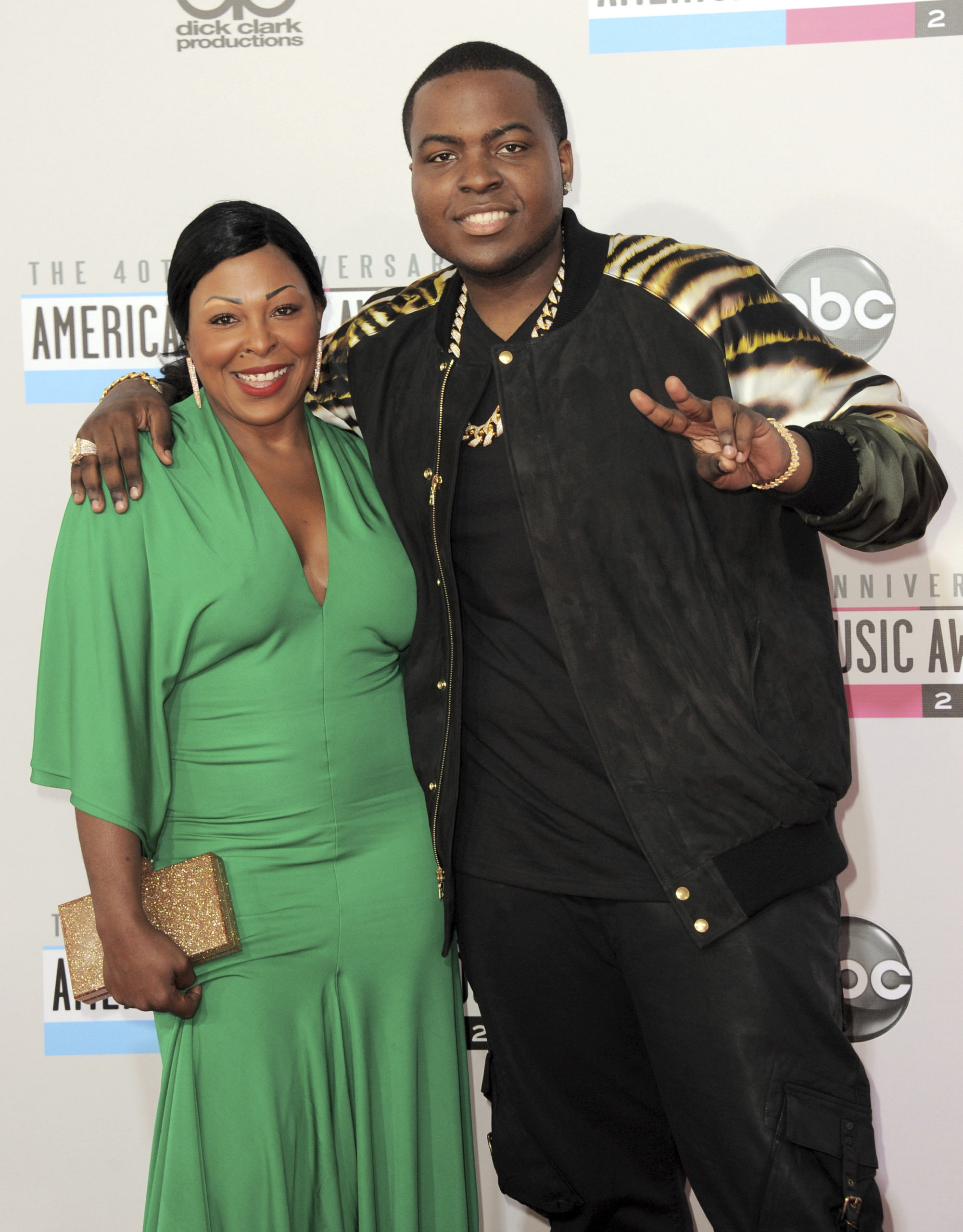 Sean Kingston, right, and his mother Janice Turner arrive at the 40th anniversary American Music Awards, November 18, 2012, in Los Angeles.