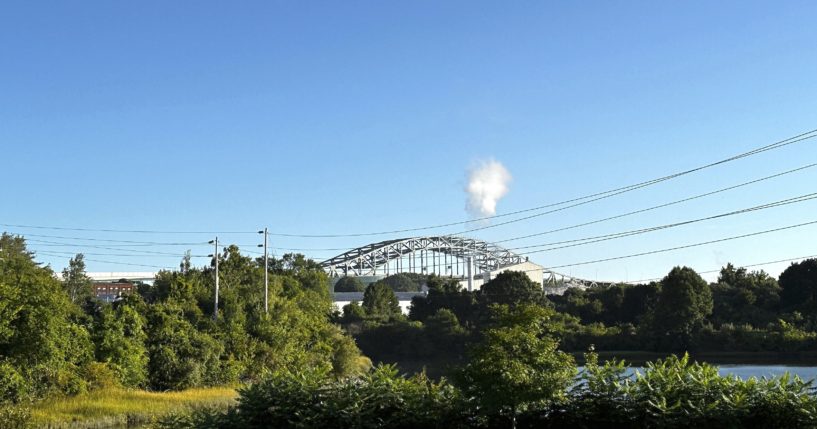 The Piscataqua River Bridge is shown in Portsmouth, New Hampshire., after a man connected to a homicide was fatally shot by police and an 8-year-old child was found shot to death in the man’s car on the bridge that connects New Hampshire to Maine on Thursday. An 8-year-old child was found shot to death in the man's car, the attorney general's office said Thursday.