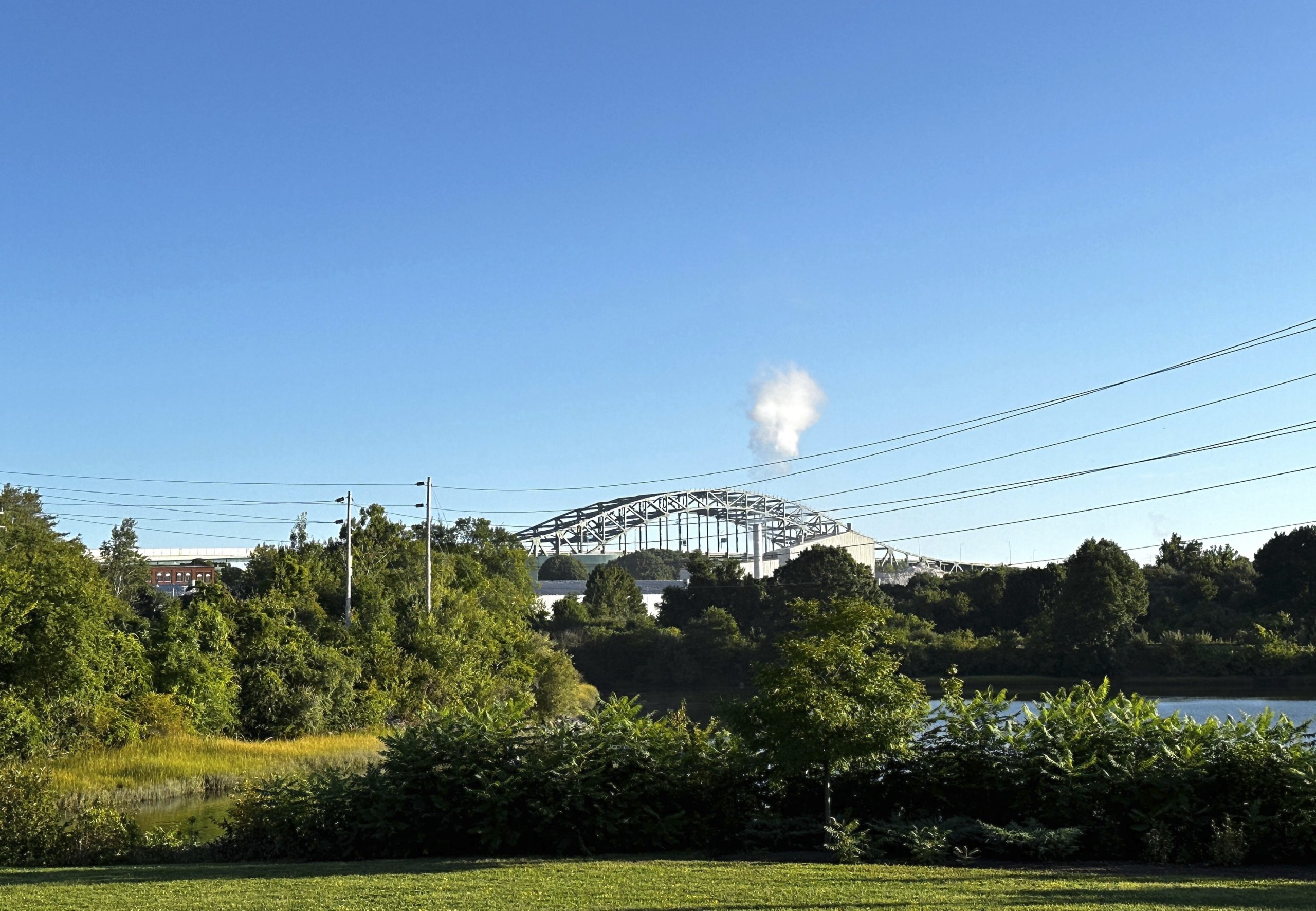 The Piscataqua River Bridge is shown in Portsmouth, New Hampshire., after a man connected to a homicide was fatally shot by police and an 8-year-old child was found shot to death in the man’s car on the bridge that connects New Hampshire to Maine on Thursday. An 8-year-old child was found shot to death in the man's car, the attorney general's office said Thursday.