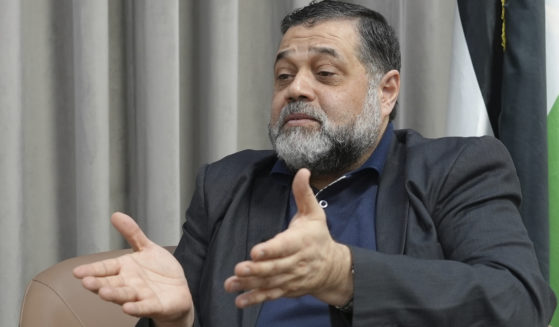 Hamas political official Osama Hamdan speaks during an interview with The Associated Press in Doha, Qatar, on Tuesday.