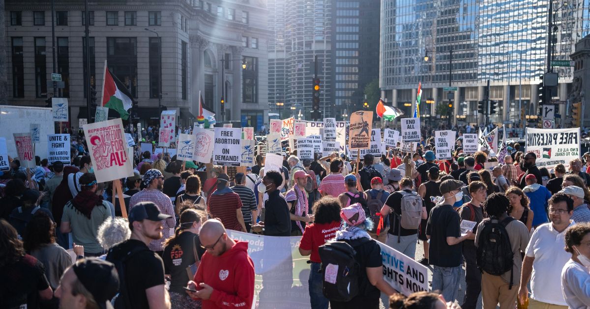 People gather for a Pro-Palestinian protest ahead of the Democratic National Convention on August 18, 2024 in Chicago, Illinois.