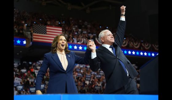 Democratic presidential candidate, U.S. Vice President Kamala Harris and Democratic vice presidential candidate Minnesota Gov. Tim Walz greet supporters during a campaign event at the Liacouras Center at Temple University on August 6, 2024 in Philadelphia, Pennsylvania.