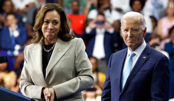 Vice President Kamala Harris and President Joe Biden are pictured on stage Thursday at Prince George’s Community College in Largo, Maryland.