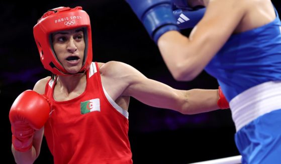 Imane Khelif of Team Algeria punches Angela Carini of Team Italy during the Women's. 66kg preliminary round match on day six of the Olympic Games Paris 2024 at North Paris Arena on August 1, 2024 in Paris, France.