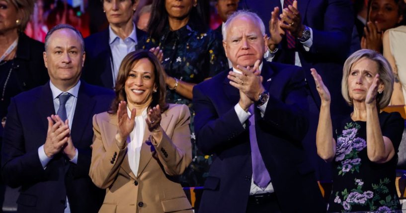 Second Gentleman Doug Emhoff, far left; Vice President Kamala Harris, middle left; Democratic vice presidential candidate Minnesota Gov. Tim Walz, middle right; and Minnesota first lady Gwen Walz, far right, attend the first day of the Democratic National Convention at the United Center on Aug.19 in Chicago, Illinois.