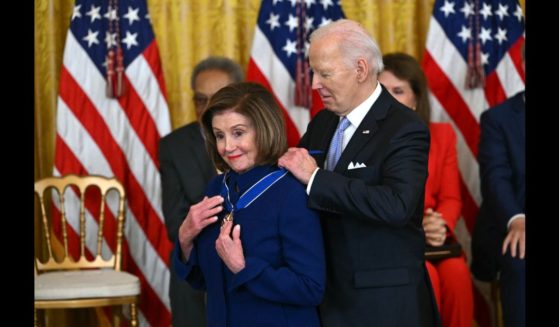 US President Joe Biden presents the Presidential Medal of Freedom to US Representative Nancy Pelosi (D-CA) in the East Room of the White House in Washington, DC, on May 3, 2024.