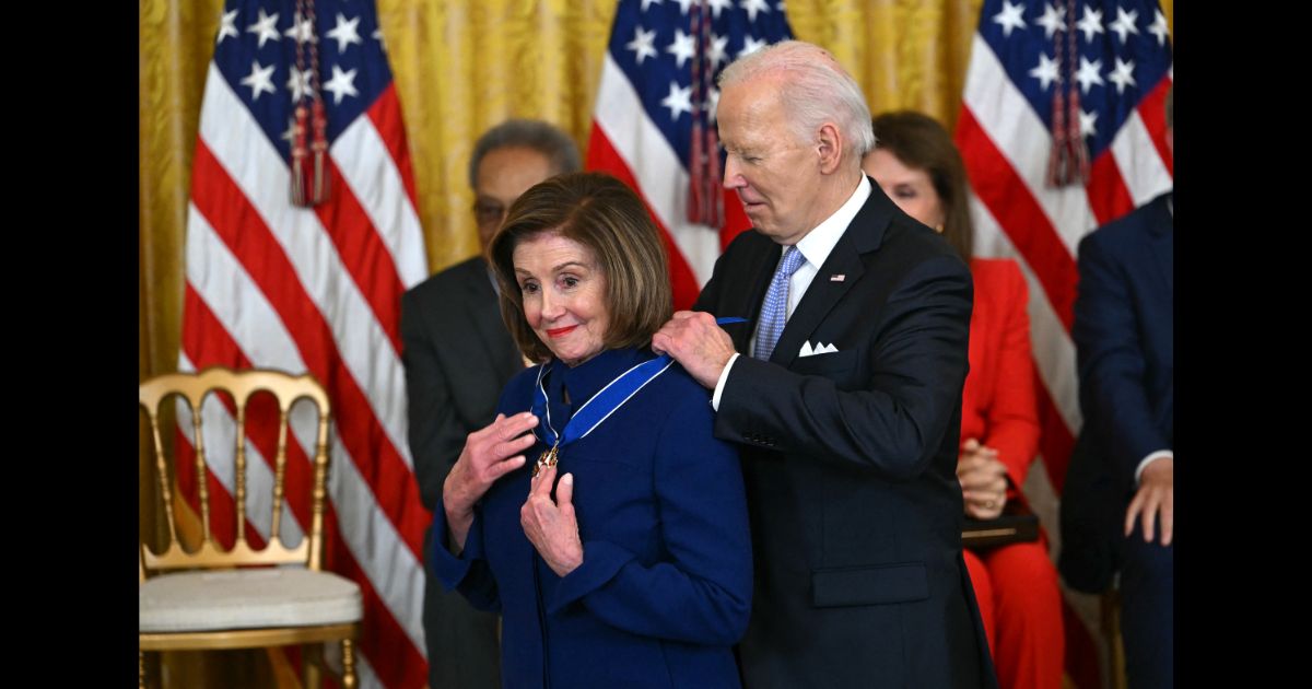 US President Joe Biden presents the Presidential Medal of Freedom to US Representative Nancy Pelosi (D-CA) in the East Room of the White House in Washington, DC, on May 3, 2024.