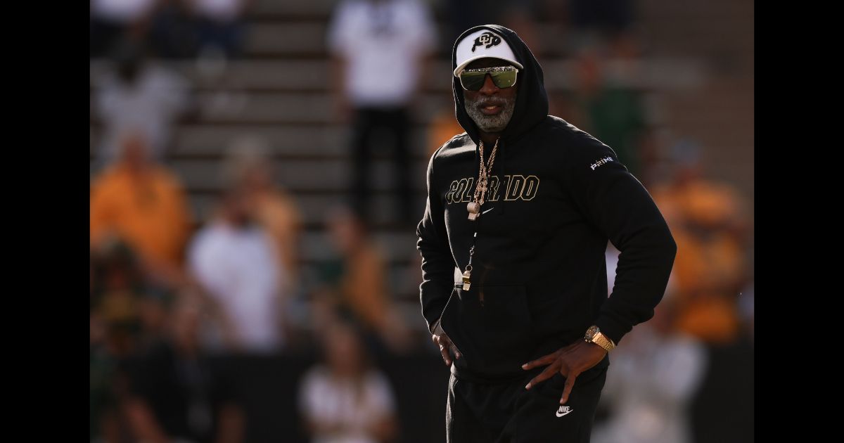 Head coach Deion Sanders of the Colorado Buffaloes walks the field during warm ups prior to the game against the North Dakota State Bison at Folsom Field on August 29, 2024 in Boulder, Colorado.