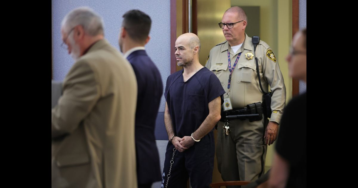 Former Clark County Public Administrator Robert Telles is led into a courtroom for an arraignment on a now-closed murder charge in Las Vegas Justice Court at the Regional Justice Center on September 20, 2022 in Las Vegas, Nevada.