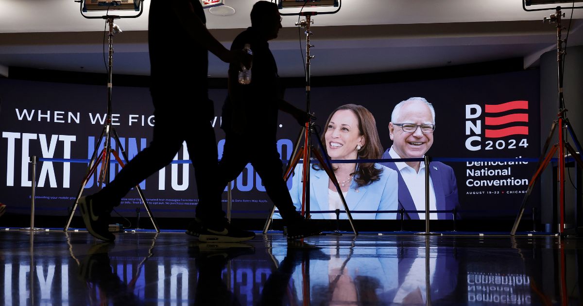 Images of Democratic presidential candidate and Vice President Kamala Harris and vice presidential candidate Gov. Tim Walz are shown on a video wall inside the United Center ahead of the Democratic National Convention on August 17, 2024 in Chicago, Illinois. The convention will be held in Chicago on August 19-22.