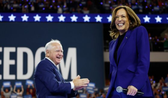 Democratic presidential candidate, U.S. Vice President Kamala Harris speaks alongside Democratic vice presidential candidate Minnesota Gov. Tim Walz at a campaign rally at the Fiserv Forum on August 20, 2024 in Milwaukee, Wisconsin.