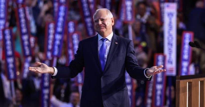 Democratic vice presidential nominee Minnesota Gov. Tim Walz reacts after accepting the vice presidential nomination during the third day of the Democratic National Convention at the United Center on August 21, 2024 in Chicago, Illinois.