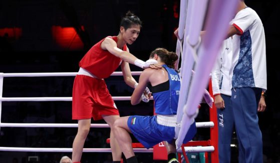 Yu Ting Lin of Team Chinese Taipei interacts with Svetlana Kamenova Staneva of Team Bulgaria after the Women's 57kg Quarter-final match on day nine of the Olympic Games Paris 2024 at North Paris Arena on August 4, 2024 in Paris, France.