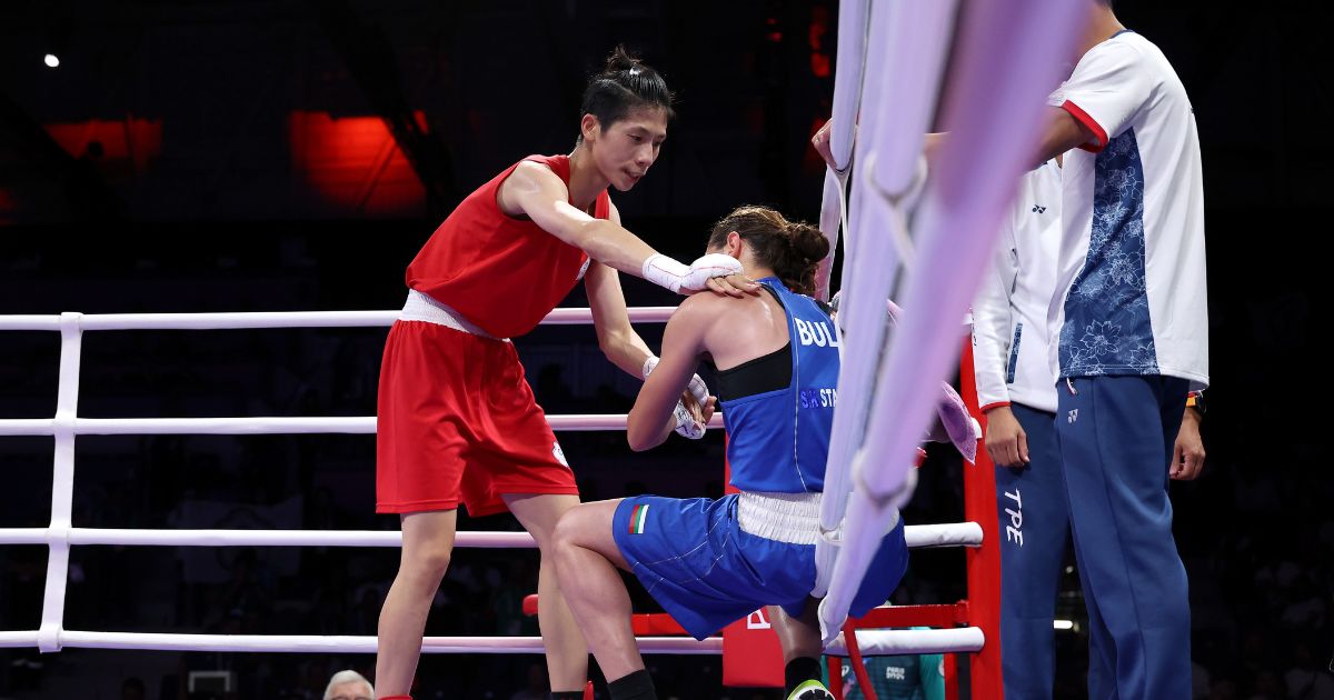 Yu Ting Lin of Team Chinese Taipei interacts with Svetlana Kamenova Staneva of Team Bulgaria after the Women's 57kg Quarter-final match on day nine of the Olympic Games Paris 2024 at North Paris Arena on August 4, 2024 in Paris, France.