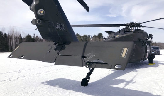 This photograph shows a damaged Black Hawk helicopter resting in the snow in Worthington, Massachusetts, on March 13, 2019.