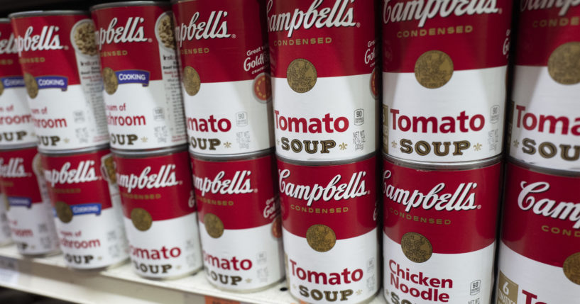 Cans of Campbell's soup are displayed in a supermarket on March 25, 2021, in New York.