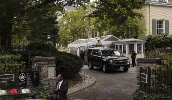 A vehicle drives out of Gracie Mansion, the official residence of New York City Mayor Eric Adams, Thursday.