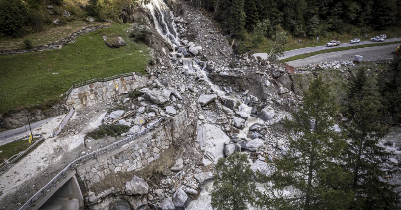 A road is blocked in Eisten, Switzerland on Friday after a landslide following severe weather.